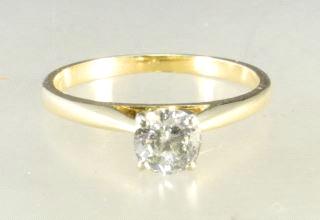 534 535 Lot # 521 521 14k yellow gold solitaire ring w/ 0..42ct round brilliant I-1, I-J.