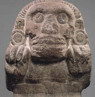 What are the most prominent images on this scene? What is the primary figure wearing? Relief with Enthroned Ruler, 8th century Mexico or Guatemala; Maya Limestone, paint; H. 35 x W.