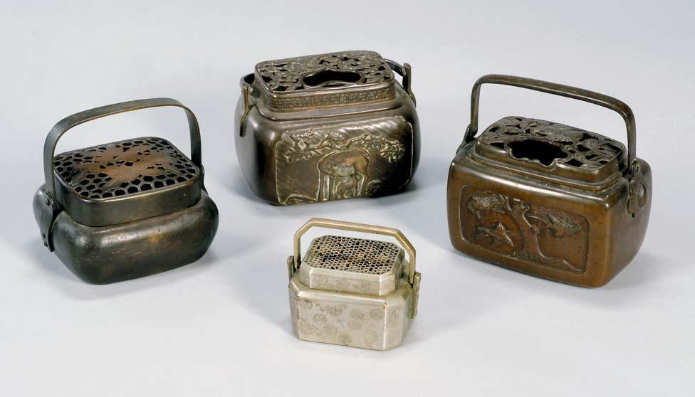 823 828. Four Bronze Items, Japan, early 20th century, three braziers with inlays of gold and silver with animal-form handles, and a flower holder with a woven bronze handle, brazier ht. 9 829.