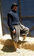 They may be Venetian hose; trousers cut full and gathered or pleated at the waist and tapering towards the knees, or padded, paned trunkhose which stop approximately at finger length.