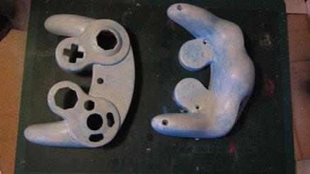 1 2 Start with a controller primed white and sanded down.