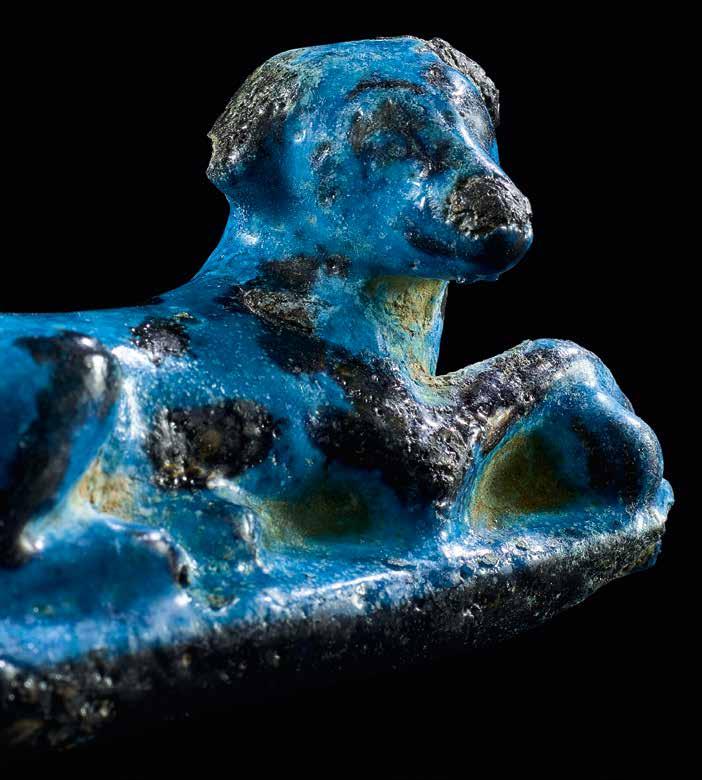 Recumbent dog Blue faience with black