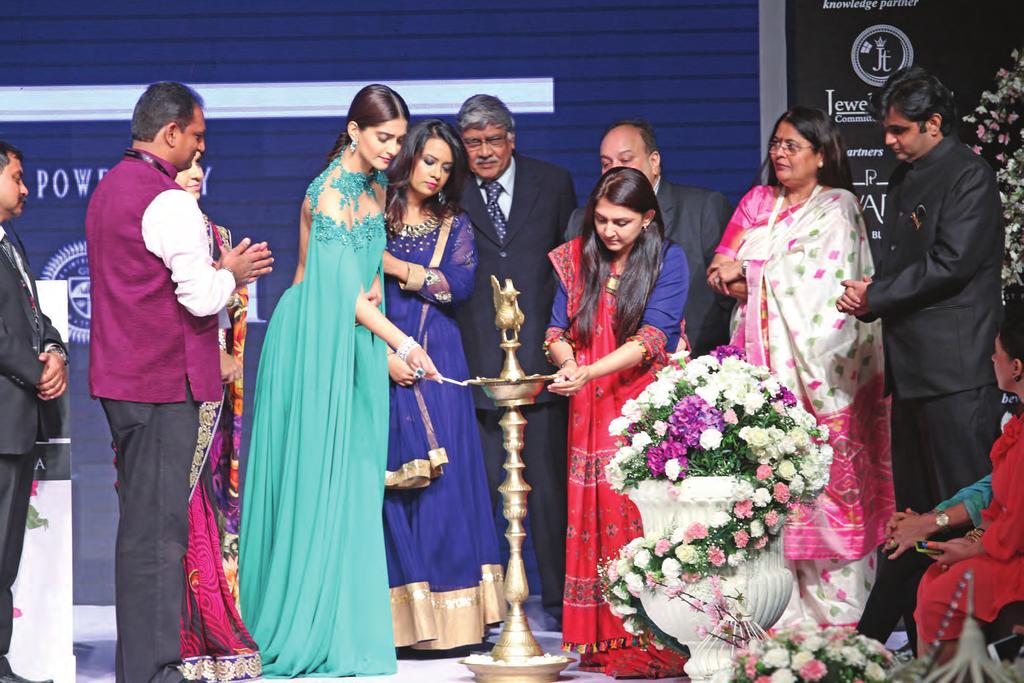 Vipul Shah, Shaina NC, Sonam Kapoor, Amruta Fadnavis, Sanjay Kothari, Mehul Choksi, Anar Patel and Nirupa Bhatt at the IIJW lamp lighting ceremony.