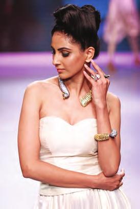 Miss India International 2014 Jhataleka Malhotra wore statement pieces from each of the five participants.