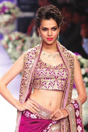 The gorgeous Konkana Bakshi wearing a gold and diamond-entwined necklace played showstopper. The Donatella line s striking abstract earrings in geometric forms followed in the segment.