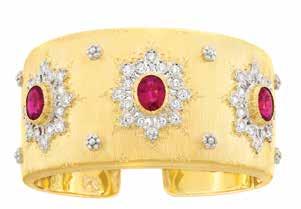 34 33 36 35 37 33 Gold, Ruby and Diamond Brooch, Grima 18 kt., the sunburst set with staggered circles of marquise-shaped rubies approximately 9.75 cts.