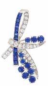 sapphires, completed by slender stems and leaf of 15 baguette and 2 triangular-cut diamonds, diamonds totaling approximately 3.95 cts., approximately 13.8 dwts.