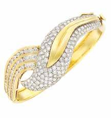 270 272 271 269 268 268 Gold, Platinum and Diamond Ring, Barmakian Brothers 18 kt., centering one oval diamond approximately 2.37 cts., flanked by 2 trilliant-cut diamonds approximately.95 ct.