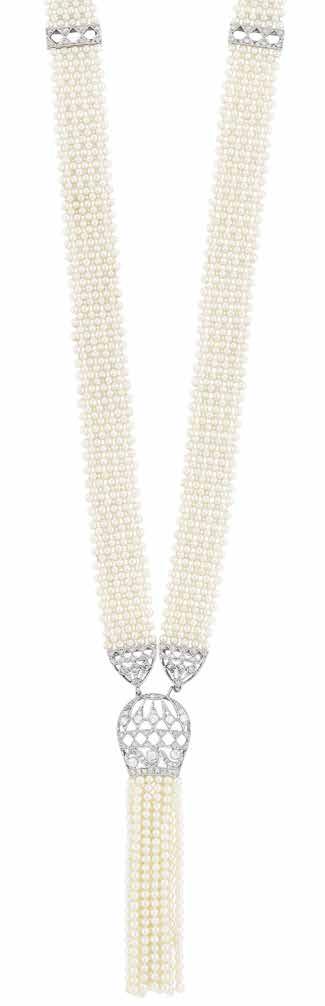 311 312 310 309 Seed Pearl Mesh, Platinum and Diamond Sautoir The long necklace composed of nine rows of pearl mesh approximately 2.3 to 2.2 mm.