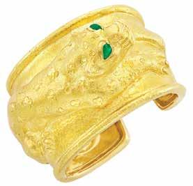 , unsigned, ring guard removed, approximately 15 dwts. Size 5. Ellin Jane Krinsly Trust $1,500-2,000 344 Hammered Gold and abochon Emerald Leopard uff Bangle Bracelet, David Webb 18 kt.