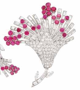 388 391 392 389 390 393 388 Platinum, Ruby and Diamond lip-brooch and Pair of Earclips The stylized flower brooch and earclips set with round, old European and single-cut diamonds, with baguette