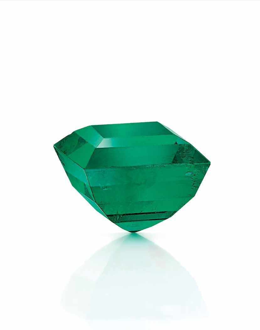 1085157 stating that the emerald is of olombian origin, with Insignificant Traditional enhancement.