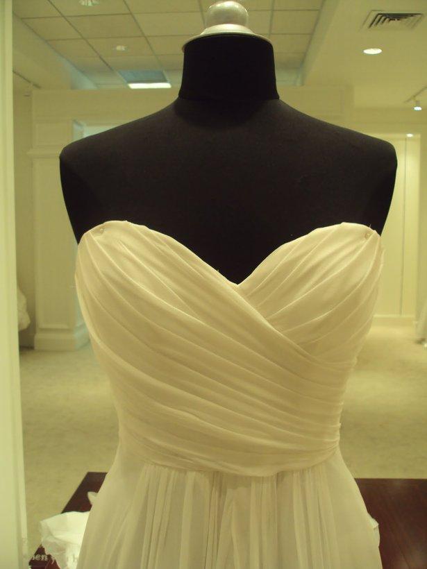 Go out and find images that will help guide you in the draping process. As a draping novice, I found a picture of a bodice that was similar to the bodice I wanted to create for the gown I'm making.