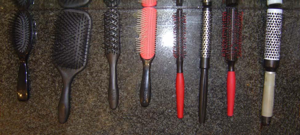 Page 2 of 6 Teasing Brush Paddle Denman Vent Brush Large Denman Denman Brushes Use on dry hair, To provide large pre-wash to surface for blow remove existing drying long hair. hair products.