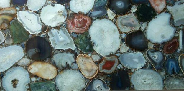 Agate Stone was given its name by the Greek philosopher and the naturalist who discovered this stone near the shore line of the river Achates sometime between 3 rd and 4 th centuries.