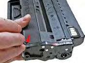 Remove the plug, and empty any toner inside before refilling the cartridge.