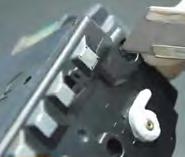 Gently pry and remove this plug using a flat head screw driver (This plug will be used to reseal the hole). Dispose of old toner before refilling it with new toner.