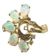 White Gold Lady s Ring with 6x9mm pear shape Opal of.94 Cts. & two round Diamonds of.05 Cts. TW. Size 6. $400.00 18Kt.