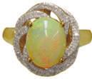 00 #10963 Lady s Ring with five 4x6mm oval Opals of 1.46 Cts. TW & five round Diamonds of.08 Cts. TW. Size 7 1/4. $517.