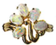 12/Vol. 511 #10958 Lady s Ring with five 4x6mm pear shape Opals of 1.10 Cts. TW. Size 6 3/4. $345.00 #10950 Lady s Ring with 7x10mm oval Opal of 1.28 Cts.