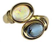 00 opal Jewelry #16730 Lady s Ring with 7x9mm oval Australian Opal of 1.60 Cts. Size 7 1/2. $325.