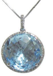 White Gold Necklace with 6x8mm oval Swiss Blue Topaz and round Diamonds of 1.46 cts. TW. Spring ring clasp.