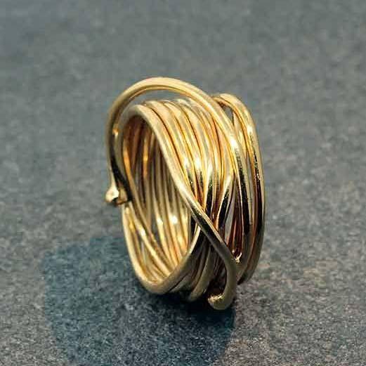 Artist: Carmen Q Name: Fun Ring in 14kt Yellow Gold Vermeil Wire Wrap Item # 6939 ALU: RSG FUN MD 10mm wide Description: 14kt Yellow Gold Vermeil Fun Ring Very thin wire is coiled around creating a