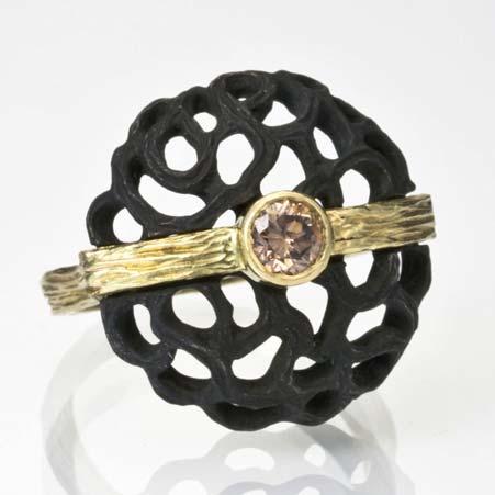 Artist: Sarah Graham Name: Shadows Circle Dome Ring with Cognac Diamond in Blackened Chrome and 18kt Yellow Gold Item # 7116 ALU: 40 R 1 3 GS Y Finger Size 6 1 Diamond at 0.