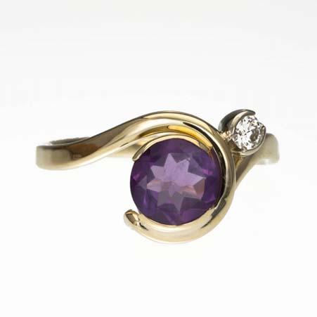 537RGDA Finger Size 6.5 Amethyst Description: 14kt Yellow Gold Hand Forged One Round Amethyst 7mm Diameter One Round Diamond at 0.