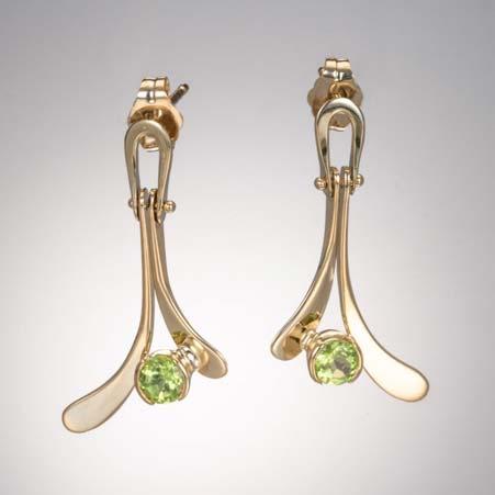 Artist: Tom Kruskal Name: Floating Peridot Earrings in 14kt Yellow Gold Item # 4360 ALU: ZME040GU Peridot Description: 14kt Yellow Gold Hand Forged Two Rd Faceted Peridot 4mm Diameter