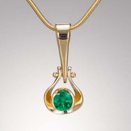 Artist: Tom Kruskal Name: Hinged Pendant with Emerald in 14kt Yellow Gold Item # 3022 ALU: ZM535DGE Emerald Description: 14kt Yellow Gold Hand Forged