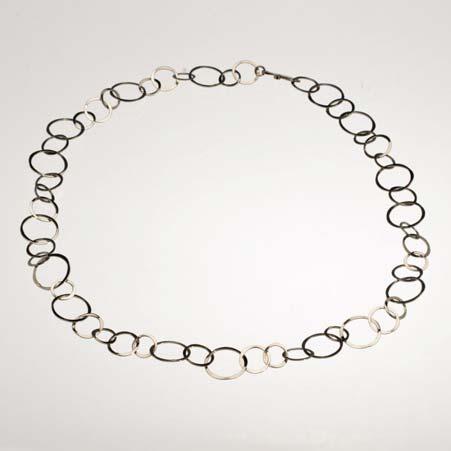 Artist: Tom Kruskal Name: Mixed Circle Chain Necklace in 14kt White Gold Item # 7163 ALU: ZMC04418W 18 inches long No Gemstone Description: 14kt White Gold Hand Forged