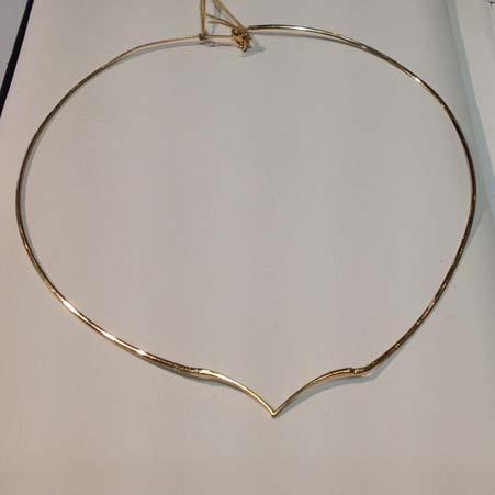 Artist: Chains Name: Chain Omega V 1.4mm 14kt Yellow Gold 18 inches Item # 4255 ALU: 62546318 18 inches long Omega Style Description: 14kt Yellow Gold 1.