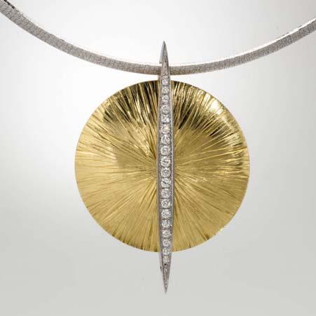 24cttw Description: Textured Disc Pendant White Diamonds 18kt Yellow and White Gold Circular slightly domed disc with grooved line texture in yellow gold swings from a pendulum of white gold and