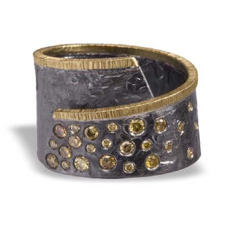 Of Band Regular Price: $735 Sale Price: $441 Artist: Elizabeth Garvin Name: Cyclone Ring with Grey Diamond Face in Oxidized Sterling Silver & 18kt Yellow Gold Item # 7093 ALU: CYCLONE R4 AU GRY