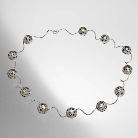 Dusted with Yellow Diamonds Post and Nut Regular Price: $2,240 Sale Price: $1,344 Artist: Elizabeth Garvin Name: Pierced Ball Link Necklace in Sterling Silver Long