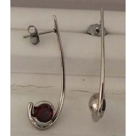 Artist: Erik Stewart Name: Rounded Line Red Garnet Earrings in Sterling Silver Item # 6245 ALU: ZMES E RNDLINE GAR Garnet Description: Sterling Silver 1mm Wide Sterling Silver Line Drops Down and