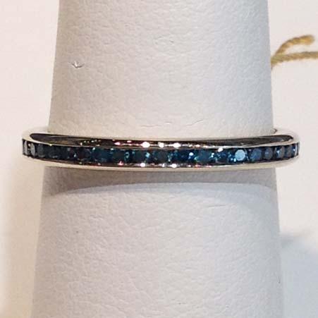 58cttw G VS Channel Set Bright Polish Finish Regular Price: $3,142 Sale Price: $2,514 Name: Eternity Band with 45 Blue Diamonds Channel Set in 18kt White Gold Item