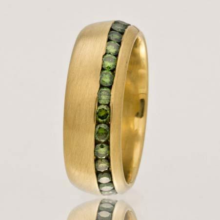 12cttw G VS Regular Price: $2,295 Sale Price: $1,836 Name: Offset Channel Band with Green Diamonds in 18kt Yellow Gold Item # 10284 ALU: ZM R613DC8M1.06/35Yg Finger Size 8.