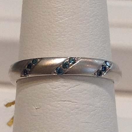 Name: Spiral Ring with Blue Diamonds in Platinum Item # 10286 ALU: ZM R376DC3M.09BLPT Finger Size 6 Description: Platinum Nine Blue Color Treated Diamonds at 0.