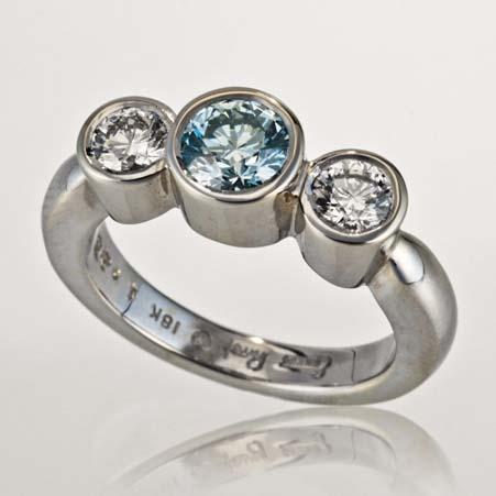 Name: Three Stone Ice Blue & White Diamond Ring in 18kt White Gold Item # 7327 ALU: ZMR798DC.70/1/.552W Size 6.25 3 Diamonds at 1.