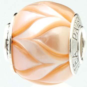 Name: Levitating Carved Peach Pearl Bead Item # 7213 ALU: CP LE PFW Description: Carved Cultured White Fresh Water Pearl with sterling silver end caps Each