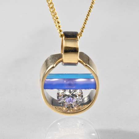 Artist: J. Kennedy Design Name: Diamond Capture Pendant with Lavender & Blue Onyx in 14kt Yellow Gold Item # 5003 ALU: 958 YG LAV BLU 18 inches long 1 Diamond at 0.