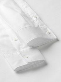 Wearing poplin THE ESSENTIAL DRESS SHIRT FABRIC Poplin is the most breathable fabric, B&C Heritage shirts are therefore ideal worn under a suit or on warmer weather