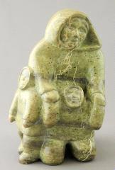 Inuit soapstone carving of a seal, length 8".