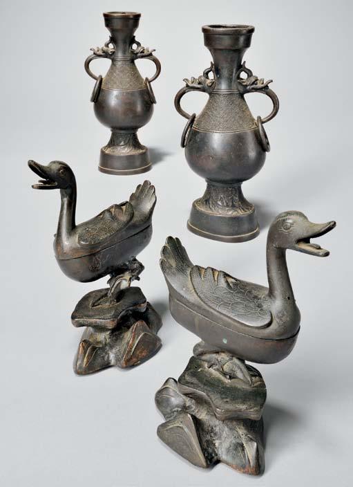 54 Two-eared Bronze Censer and Tripod Stand, Japan, 20th century, the censer, pear-shape with flattened bottom and wide neck, resting on a straight circular foot, two angular loop handles to sides,