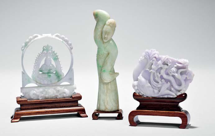 127 137 128 127 Jadeite Carving of Buddha, China, 20th century, seated on a lotus throne before a bell-shaped aureole with flame, enshrined in a roundel placed on a rectangular pedestal decorated