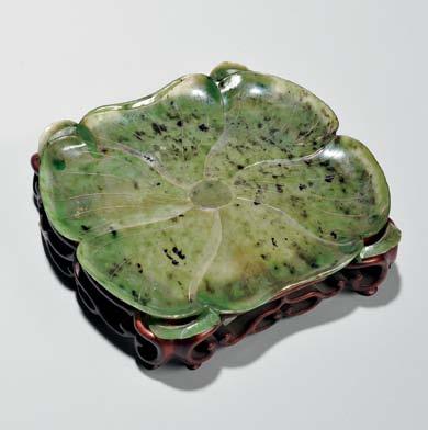 161 162 161 Jade Lotus Leaf Tray with Stand, China, near square, the six-lobed lotus leaf with edges slightly rolled upward, each of the four corners accentuated with a curled peach-leaf designed to