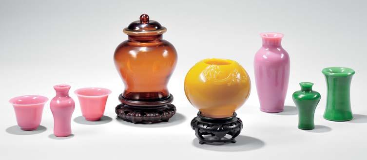 $400-500 182 Peking Glass Vase, China, 18th/19th century, baluster shape, with a narrow neck and everted rim, the glass color a deep saturated raspberry pink, ht.