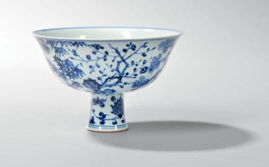 249 246 Pair of Export Blue and White Dishes, China, 18th century, each with molded upper body and barbed rim, resting on a raised foot, decorated with a bird-and-flower design with rocks and